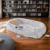 A human-specific dog bed featuring a washable faux fur design