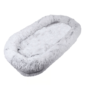 A human-specific dog bed featuring a washable faux fur design